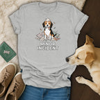 Beagle dog sitting in a pile of torn pillows with "MINOR INCIDENT" text.