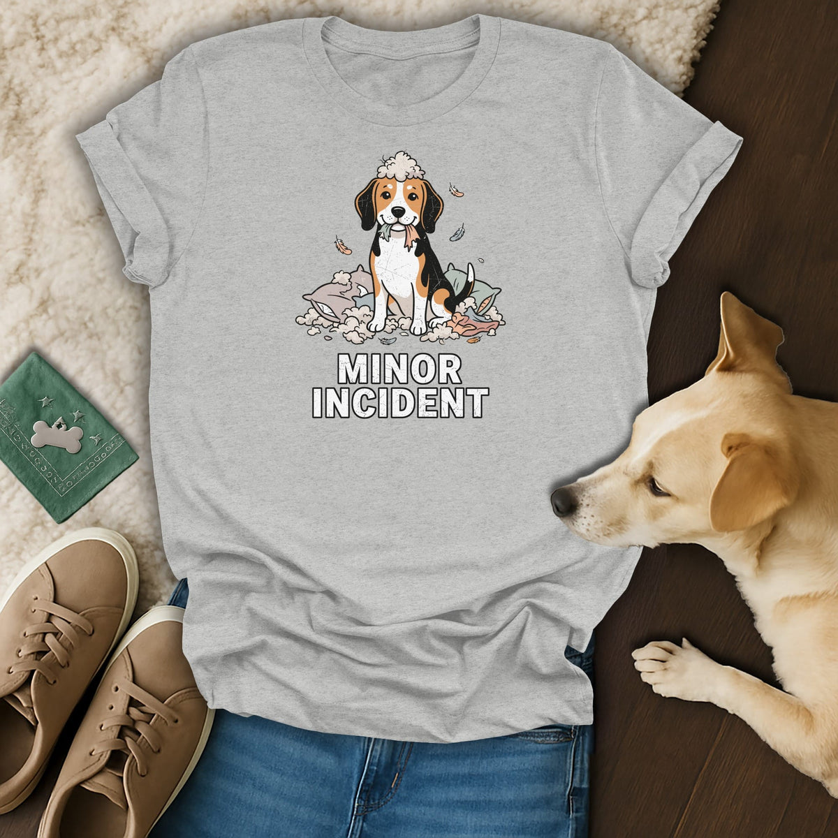 Beagle dog sitting in a pile of torn pillows with "MINOR INCIDENT" text.