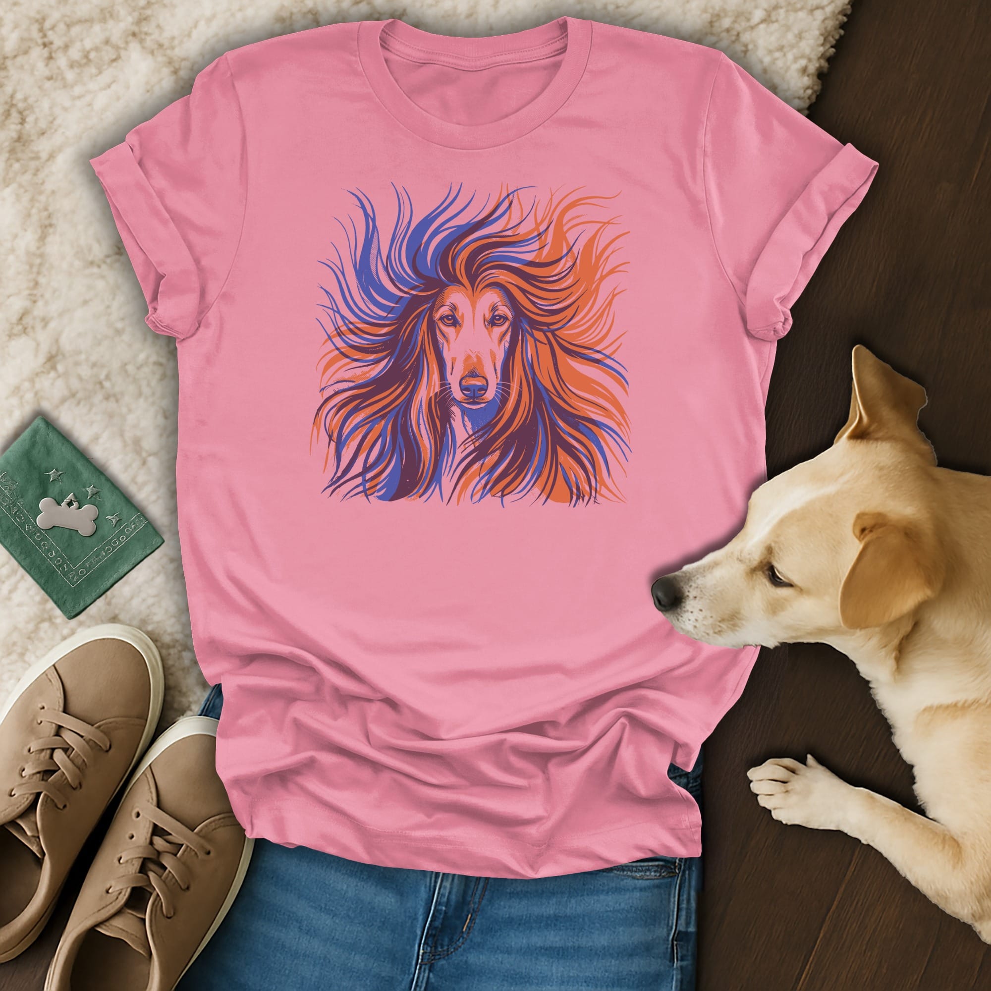 Pink t-shirt with abstract orange and blue dog portrait.