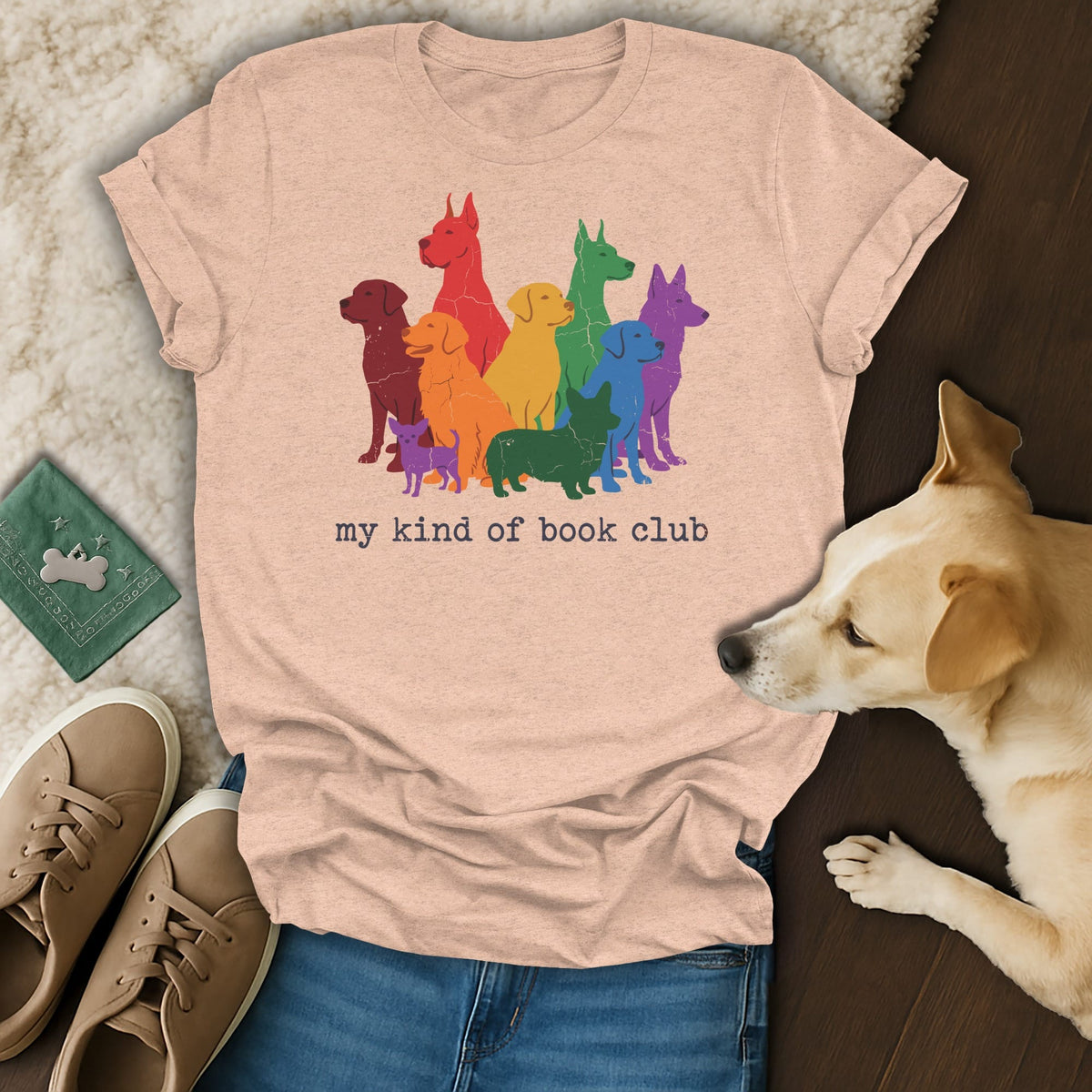 T-shirt with colorful dog silhouettes and "my kind of book club" text.
