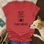 Red t-shirt with a dog holding a baguette and the text "PURE BREAD."