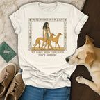 T-shirt with Egyptian woman and dogs, text "WE HAVE BEEN GORGEOUS SINCE 3000 BC."