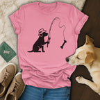 Black silhouette of a dog with a hat fishing for a bone.