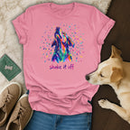 Pink t-shirt with colorful dog head and "shake it off" text.