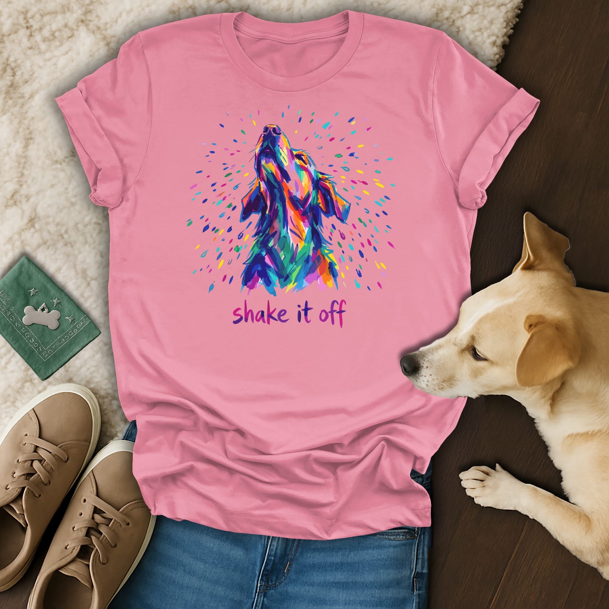 Pink t-shirt with colorful dog head and "shake it off" text.