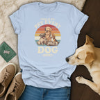 Light blue t-shirt with "This is my pet every dog shirt" and retro dogs graphic.