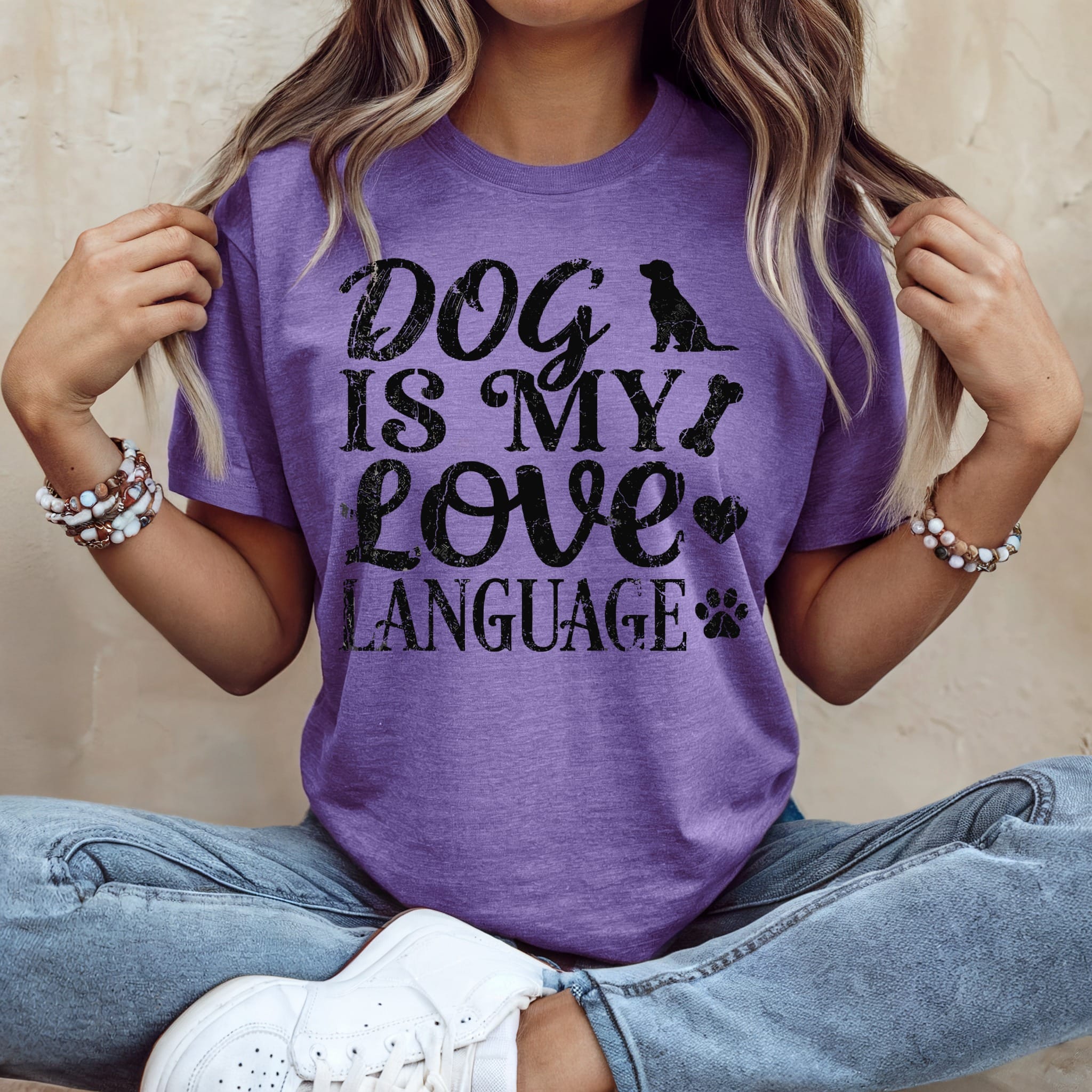 Purple t-shirt with "Dog is My Love Language" text and dog paw prints.