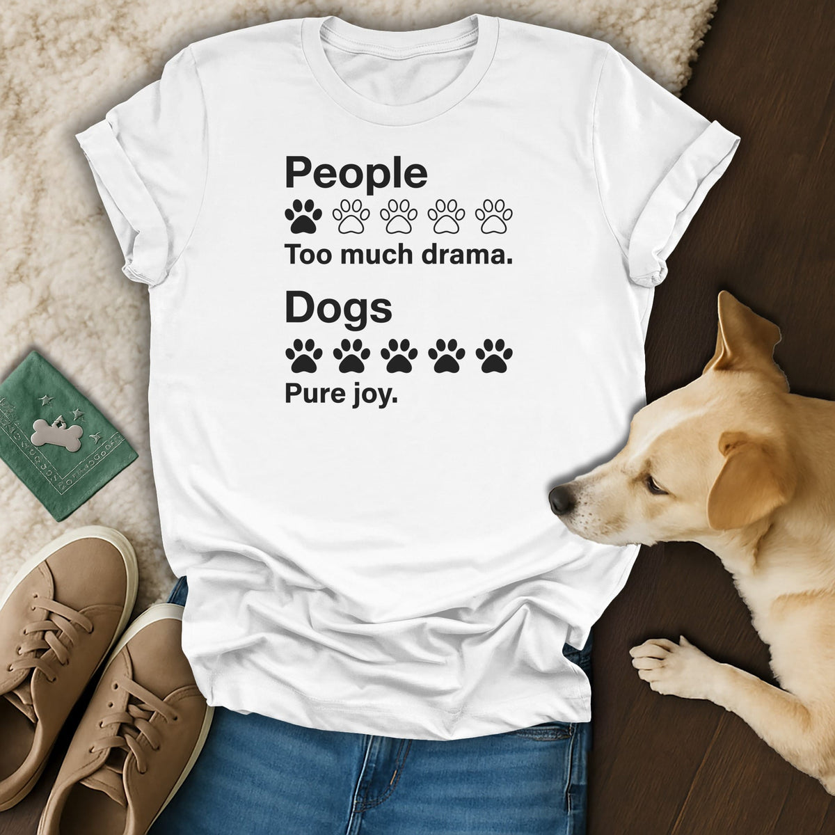 White t-shirt with black text and paw prints about people and dogs.