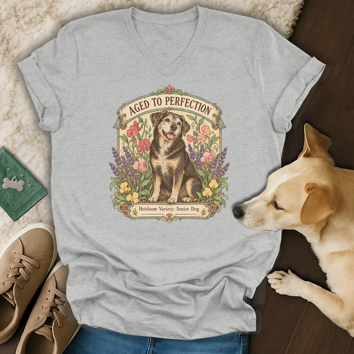 Heather grey v-neck t-shirt featuring a vintage floral graphic of a senior dog and text reading Aged to Perfection.