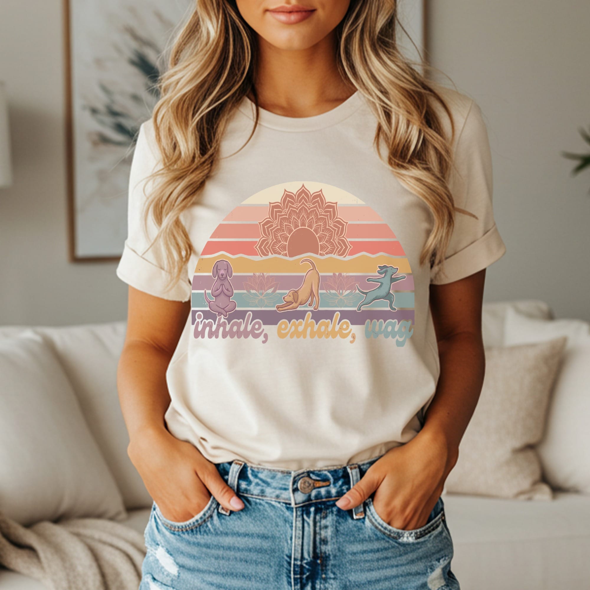 Cream t-shirt with sunset mandala and yoga dogs, reading "inhale, exhale, wag."