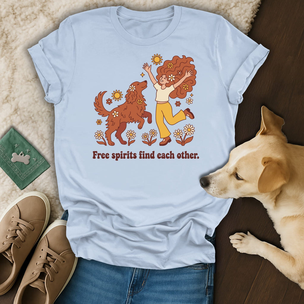 Light blue t-shirt with graphic of woman and dog, text "Free spirits find each other."