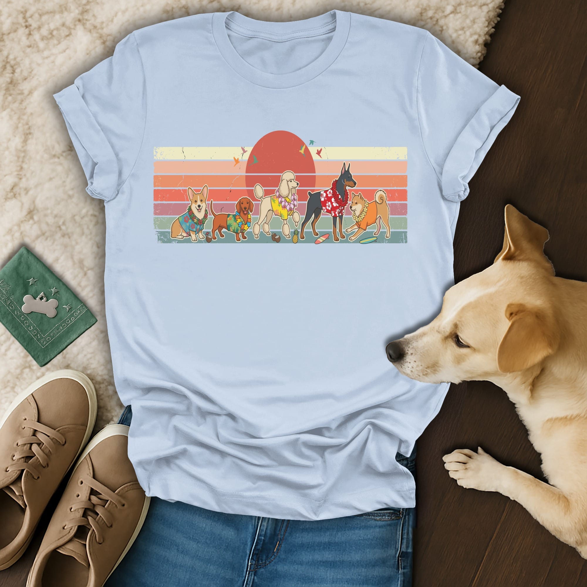 T-shirt with retro dogs and sunset graphic.