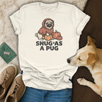 Cream t-shirt with "Snug as a Pug" text, featuring a pug and pumpkins.