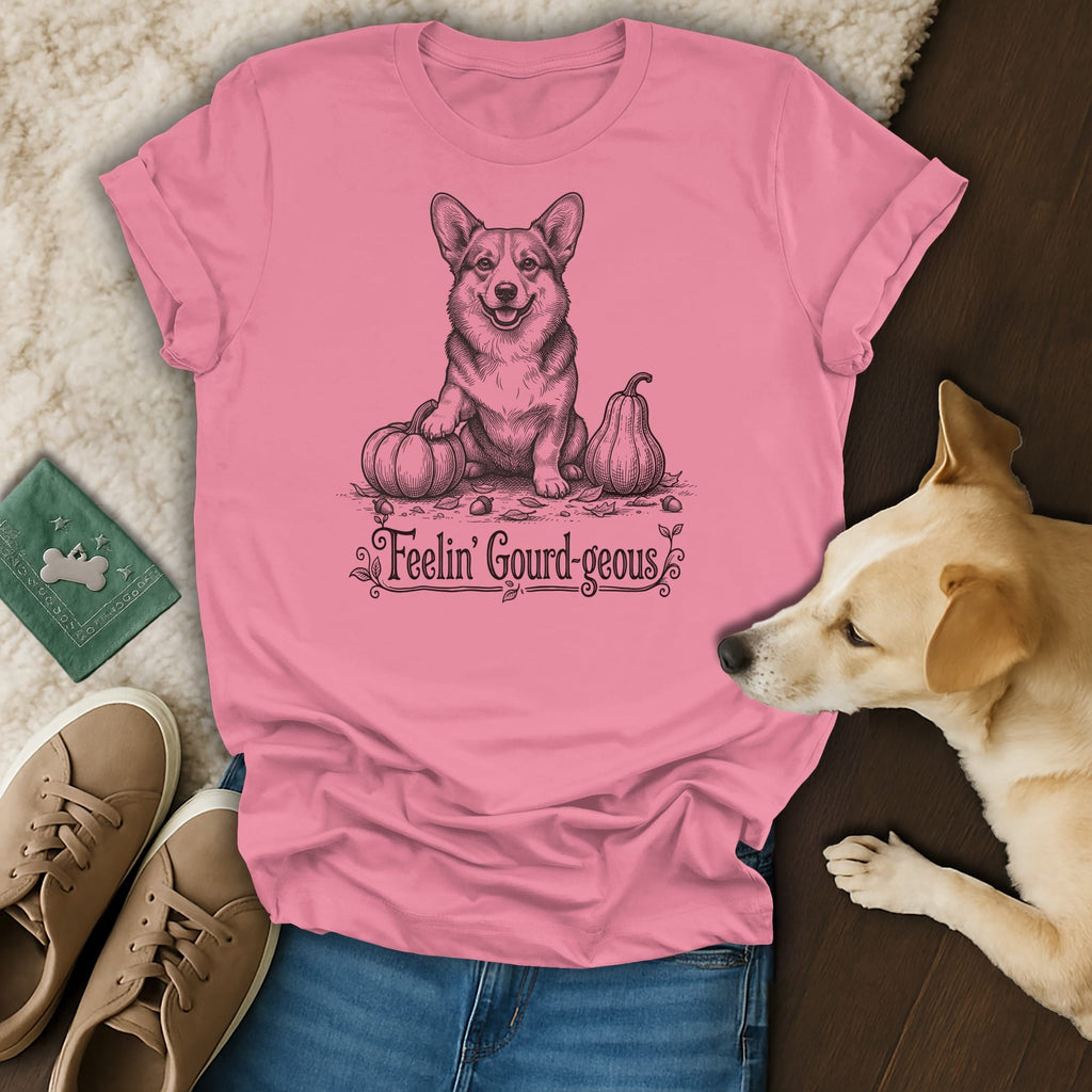Pink t-shirt with a corgi, pumpkins, and text "Feelin' Gourd-geous".