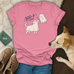 Pink t-shirt with "Boo-p" text and illustration of a dog dressed as a ghost meeting a friendly ghost.
