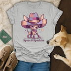 Gray t-shirt with a chihuahua in a cowboy hat and boots, with text "Spurs & Sparkles".