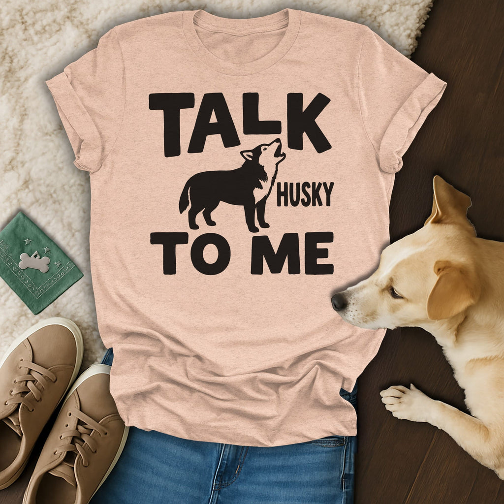 Peach t-shirt with "TALK TO ME HUSKY" and silhouette of a howling husky.