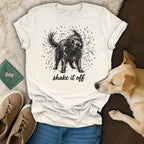 White t-shirt with black line drawing of a wet, shaggy dog shaking off water.