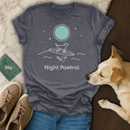 Dark gray t-shirt with "Night Patrol" text and dog on surfboard graphic.