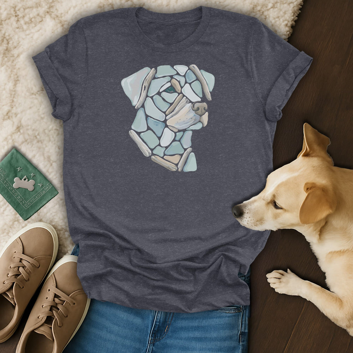 Dark grey t-shirt with a mosaic dog face design and a real dog.
