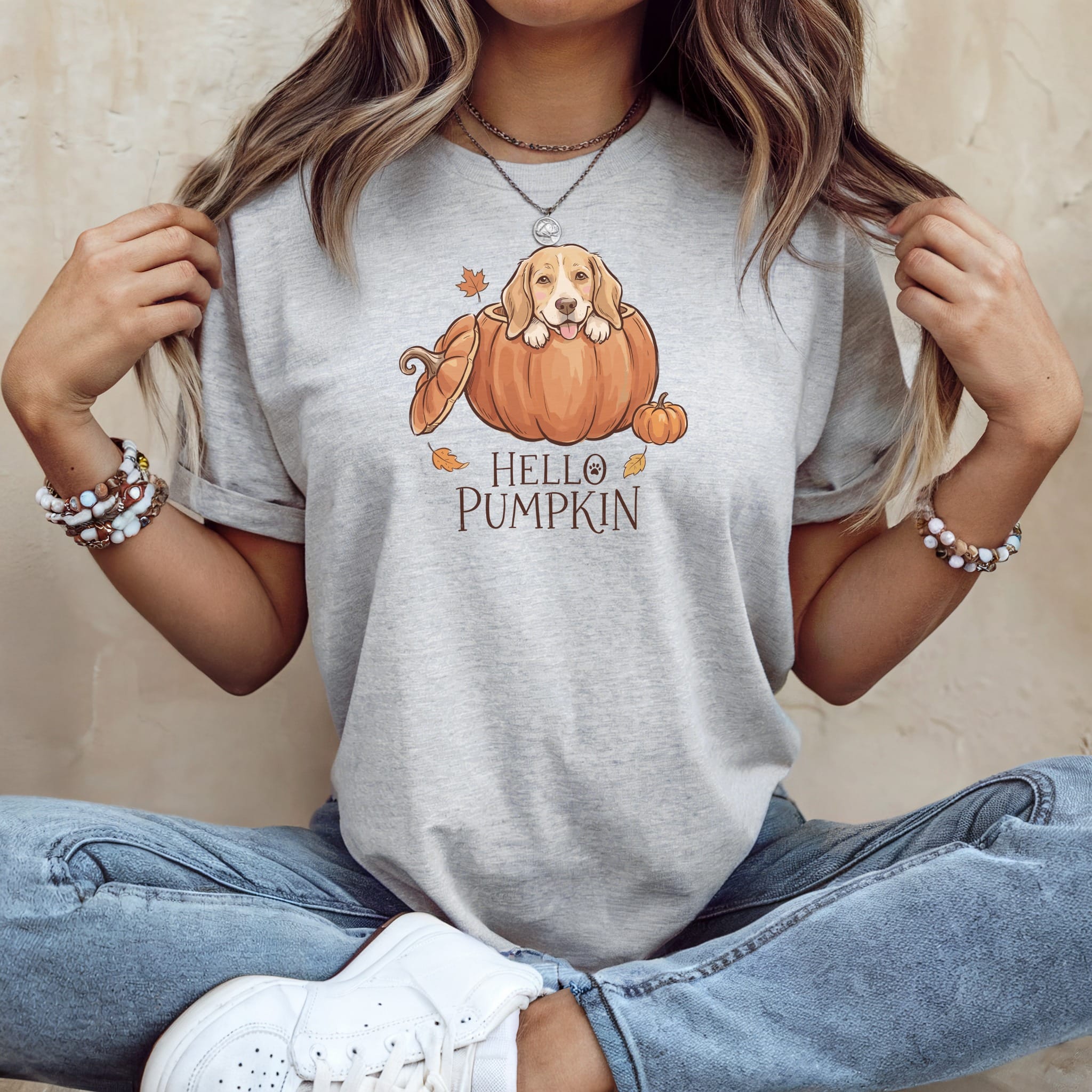 Light grey t-shirt with a dog in a pumpkin illustration and "HELLO PUMPKIN" text.
