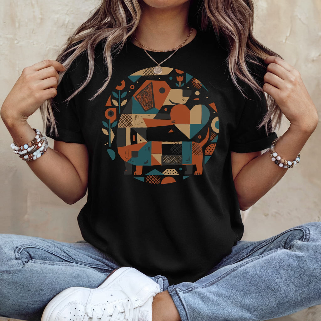 Black t-shirt featuring a geometric dachshund graphic with colorful shapes.