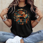 Black t-shirt featuring a geometric dachshund graphic with colorful shapes.