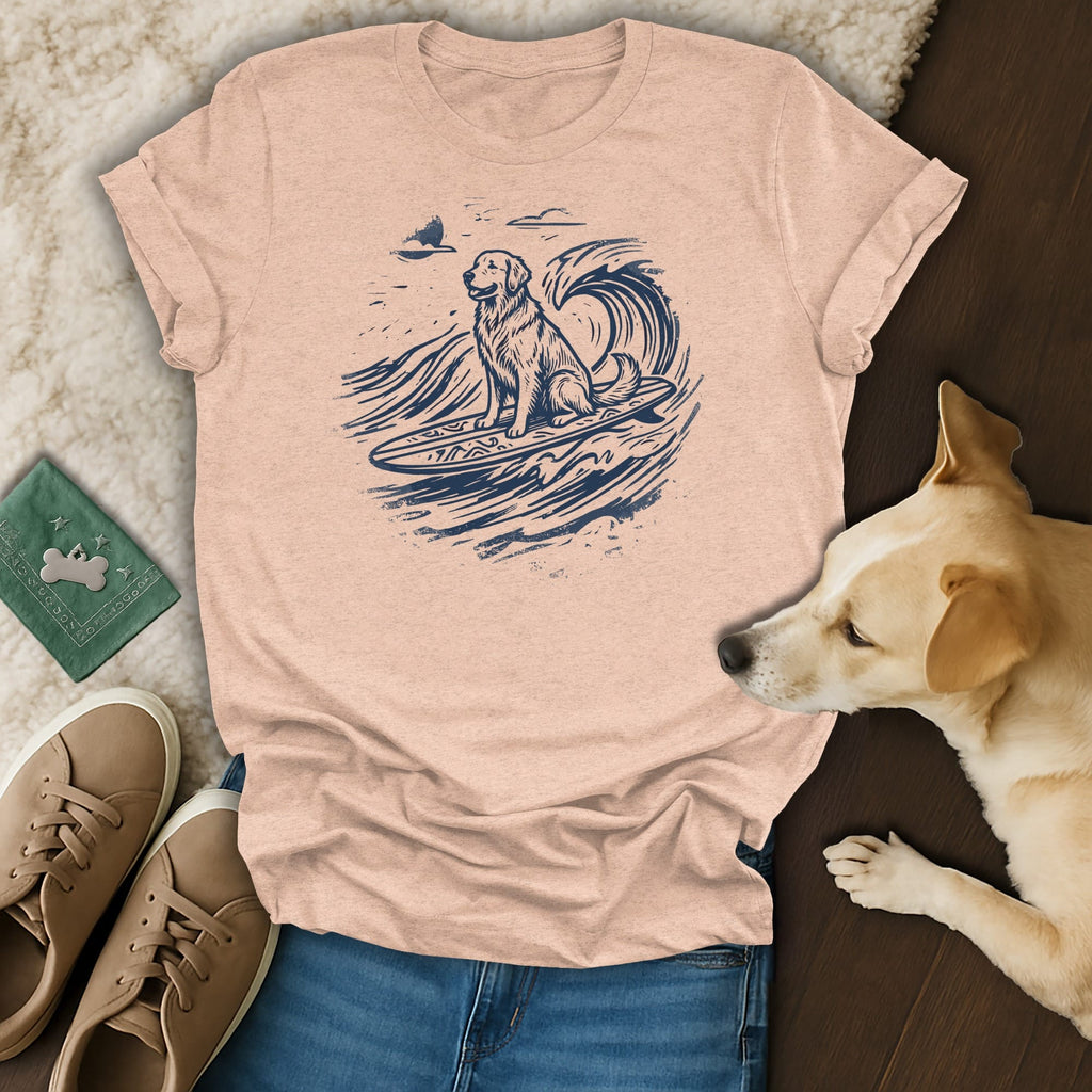 Golden retriever on surfboard, riding a wave, blue ink sketch on peach t-shirt.