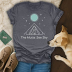 Dark grey t-shirt with "The Mutts See Sky" and a dog inside a tent under stars.