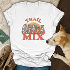 White t-shirt with cartoon dogs hiking and the text "TRAIL MIX".