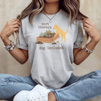 Grey t-shirt graphic with yellow dog gardening and text "dirt therapy dog included."