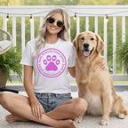 Woman in t-shirt with dog, circle graphic says "best friends have paws."