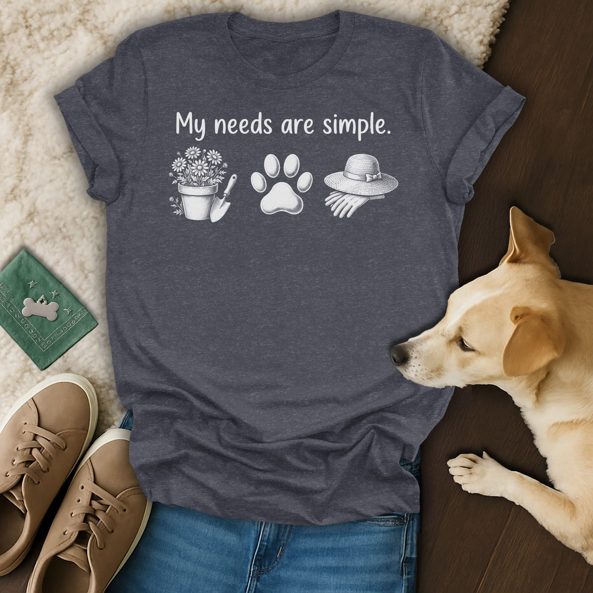 Dark grey t-shirt with "My needs are simple." and gardening/dog icons.