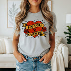 Gray t-shirt with heart banner saying "My Dog Owns Me".