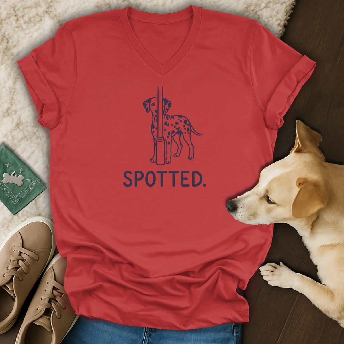 Red v-neck t-shirt with a Dalmatian graphic and the word "SPOTTED."