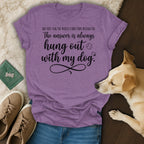 Purple t-shirt with text "The answer is always hung out with my dog."