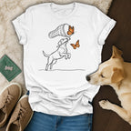 Dog in sketch art style reaching for butterflies with a net.