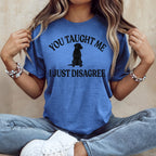 Blue t-shirt with black dog silhouette and text "YOU TAUGHT ME I JUST DISAGREE".