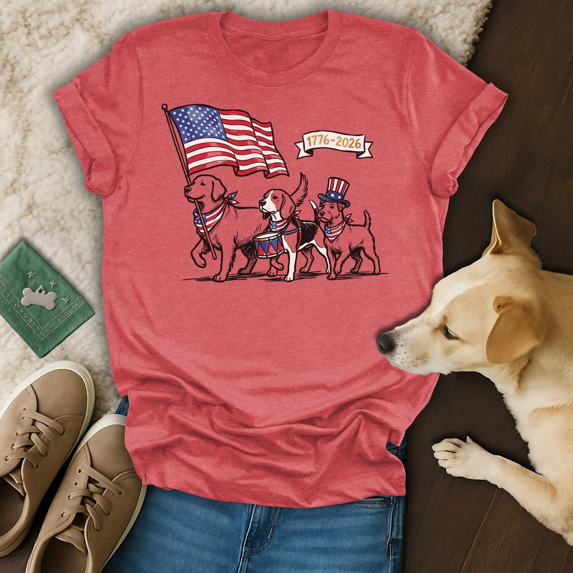 T-shirt with dogs in patriotic attire, carrying a flag and drum.
