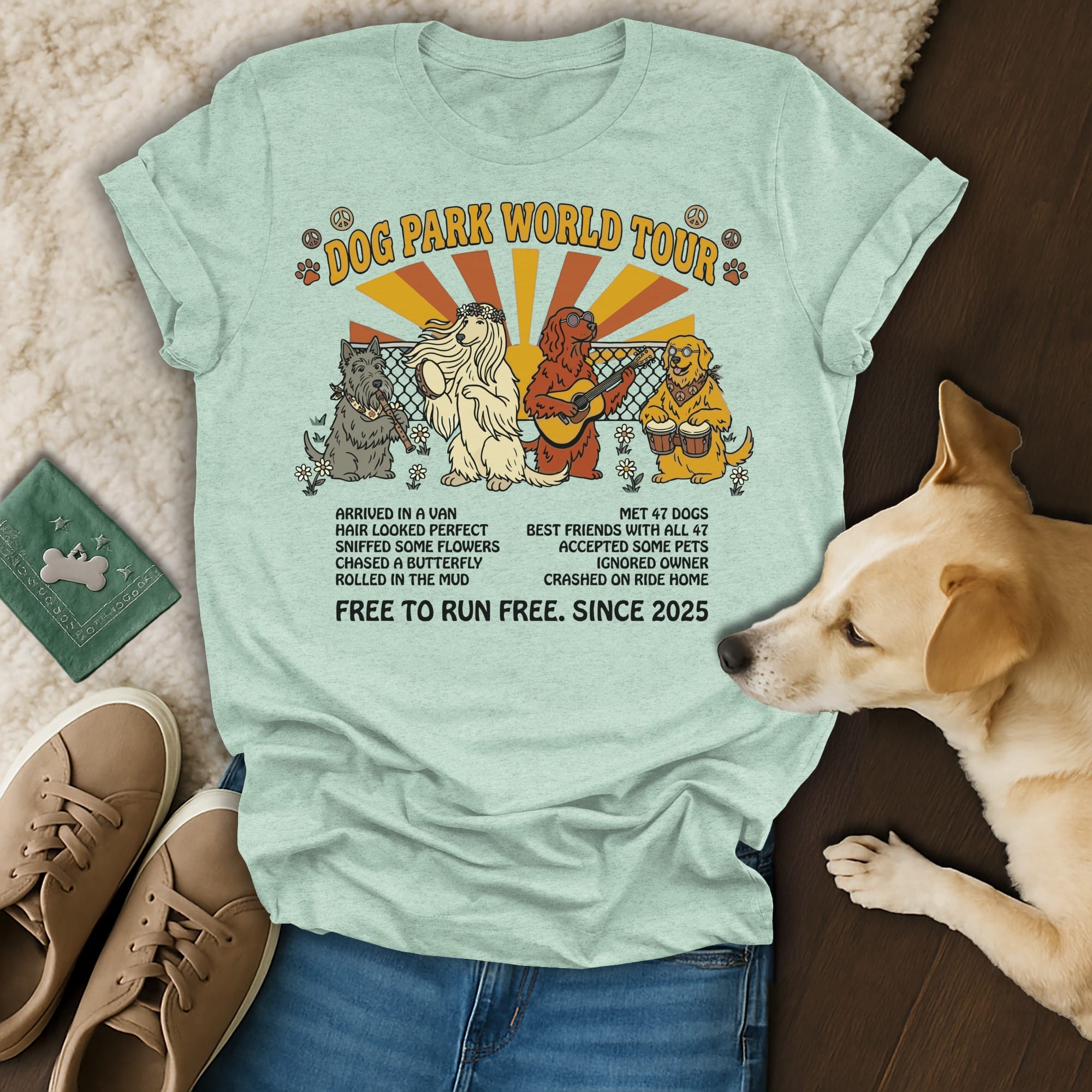 "Dog Park World Tour" graphic tee with four dogs and text about their adventures.