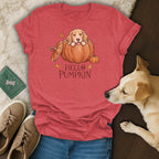 Red t-shirt with a dog peeking out of a pumpkin and text "HELLO PUMPKIN".