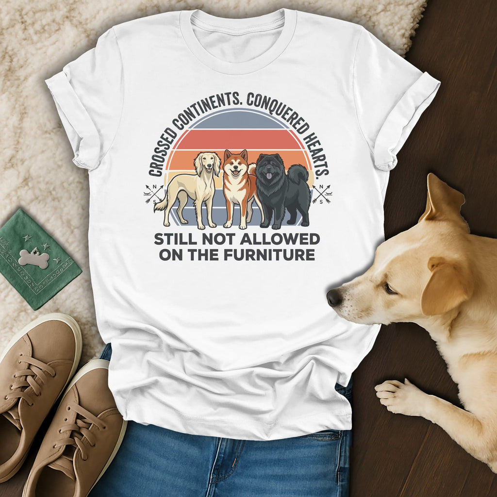 T-shirt with three dogs and text "Crossed Continents. Conquered Hearts. Still Not Allowed On The Furniture."