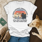 T-shirt with three dogs and text "Crossed Continents. Conquered Hearts. Still Not Allowed On The Furniture."