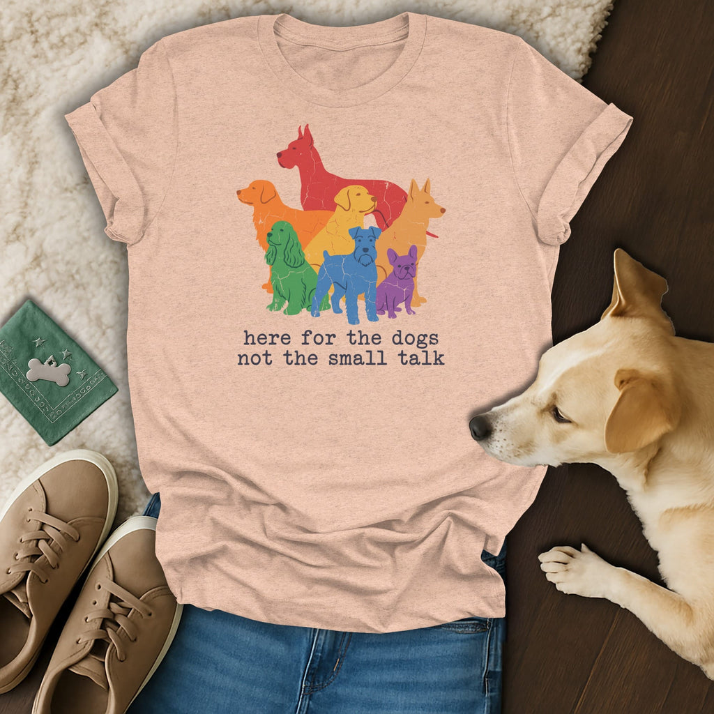 Peach t-shirt with rainbow dogs graphic and text "here for the dogs not the small talk".