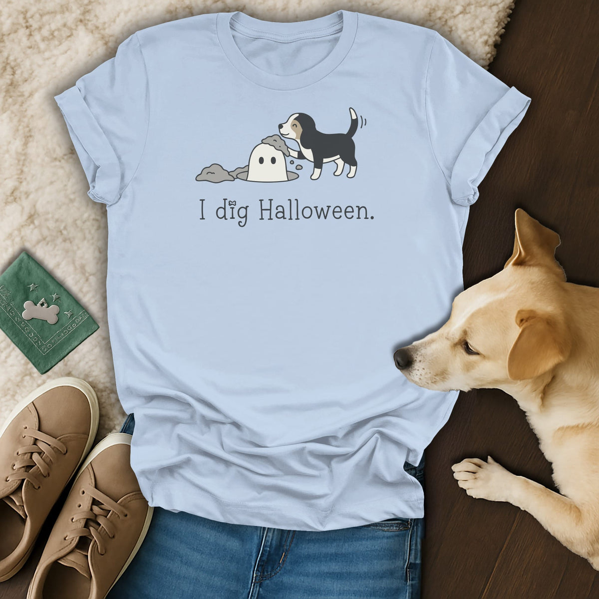 Light blue t-shirt with graphic of dog digging a ghost and text "I dig Halloween."