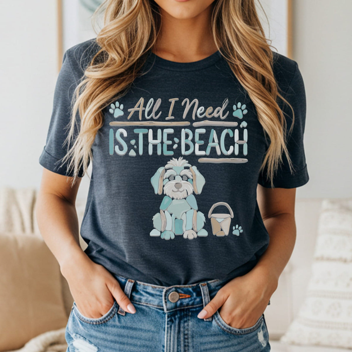 Dark t-shirt with "All I Need IS THE BEACH" graphic and a sitting dog.