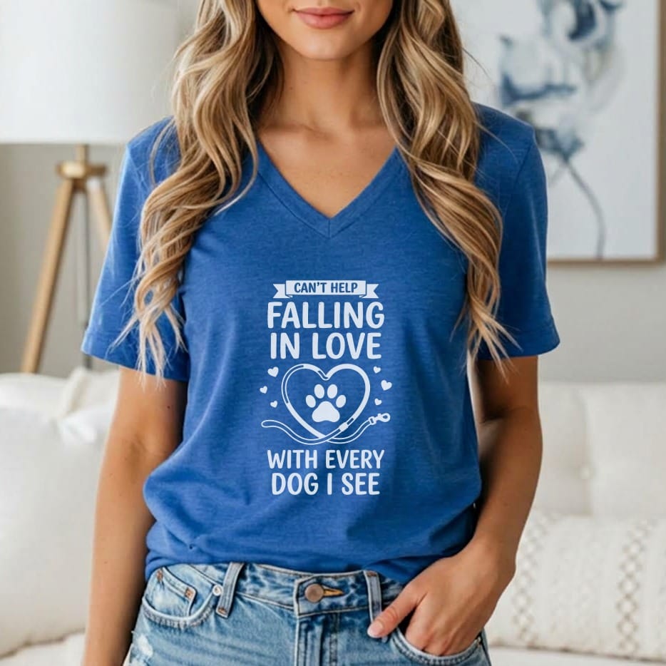 Blue t-shirt with "Can't Help Falling In Love With Every Dog I See" text and paw print.