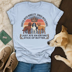 T-shirt with three dogs and text "Hunted with nobility. Dined with kings. Just ate an entire stick of butter."