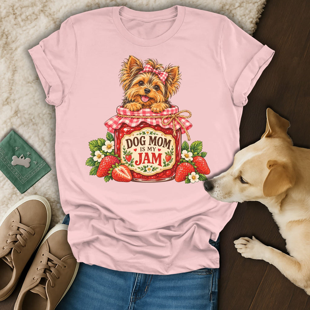 A pink t-shirt featuring a Yorkie puppy in a strawberry jam jar with the text Dog Mom Is My Jam.