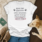 White t-shirt with text "Road Trip Essentials," "Open Windows," "Good Snacks," "Loud Singing," "Good Dog."